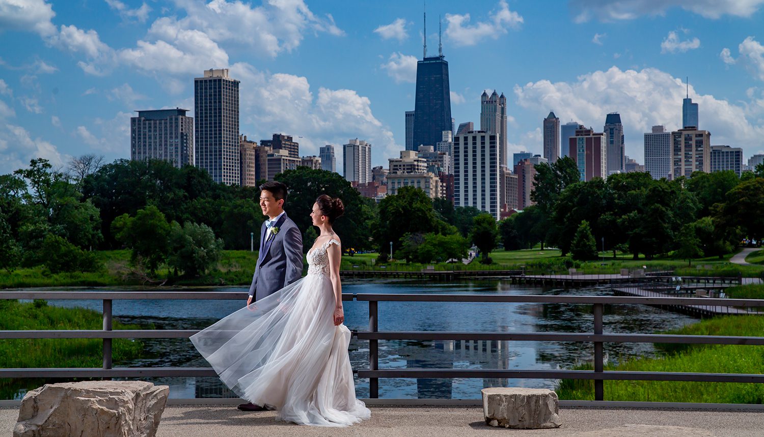 wedding portrait sunny day in chicago with city skyline